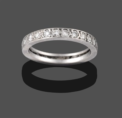 Lot 2124 - A Diamond Eternity Ring, the eight-cut diamonds in white claw settings, total estimated diamond...