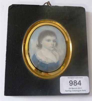 Lot 984 - English School, 19th century: Portrait Miniature of a Child, in blue jacket with white collar,...