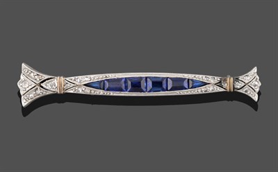 Lot 2133 - A Synthetic Sapphire and Diamond Brooch, realistically modelled as a bow motif with gathering...
