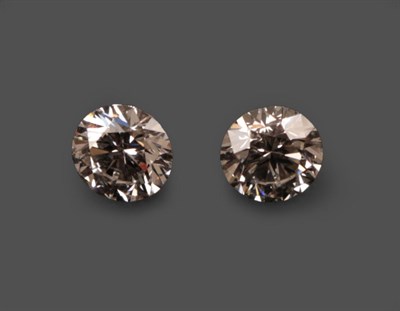 Lot 2139 - Two Loose Round Brilliant Cut Diamonds, weighing 0.53 and 0.54 carat approximately not illustrated