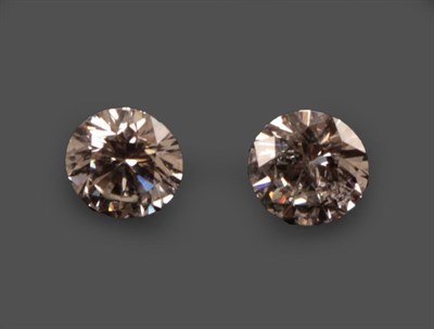 Lot 2150 - Two Loose Round Brilliant Cut Diamonds, weighing 0.39 and 0.42 carat approximately not illustrated