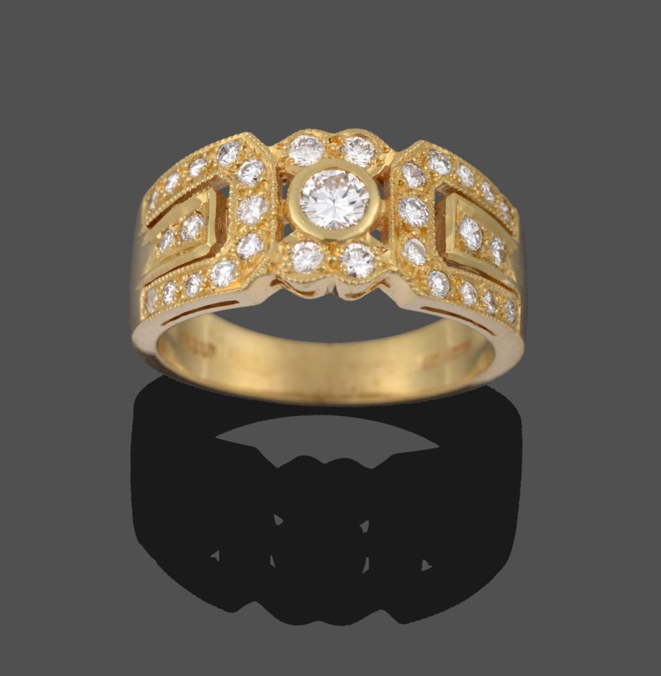 Lot 2162 - An 18 Carat Gold Diamond Ring, a central cluster of round brilliant cut diamonds within...
