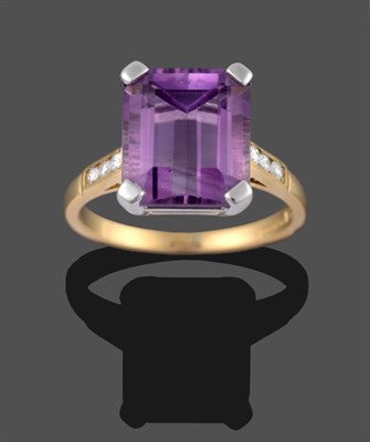 Lot 2172 - An 18 Carat Gold Amethyst and Diamond Ring, the emerald-cut amethyst in a white corner claw...