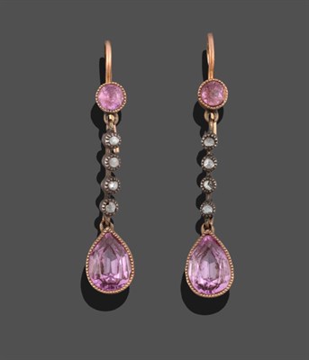 Lot 2182 - A Pair of Synthetic Pink Sapphire Earrings, a round synthetic pink sapphire in a yellow...