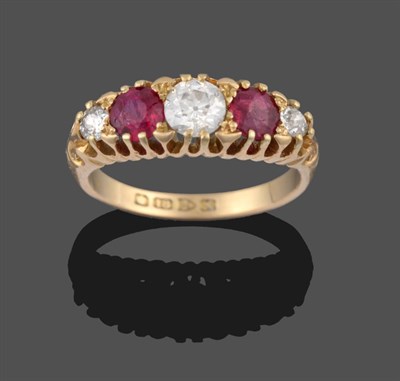 Lot 2184 - A Diamond and Ruby Five Stone Ring, three graduated old cut diamonds alternate with two round...