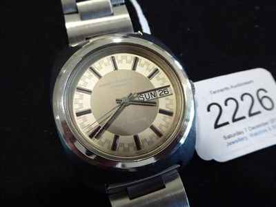 Lot 2226 - A Stainless Steel Automatic Centre Seconds Day/Date Wristwatch, signed Girard Perregaux, model:...