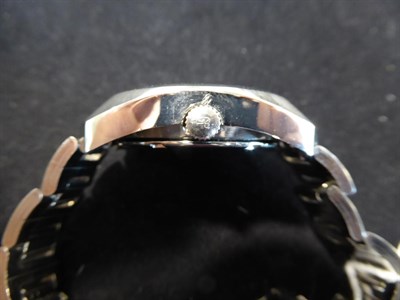 Lot 2226 - A Stainless Steel Automatic Centre Seconds Day/Date Wristwatch, signed Girard Perregaux, model:...