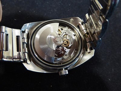 Lot 2226 - A Stainless Steel Automatic Centre Seconds Day/Date Wristwatch, signed Girard Perregaux, model:...