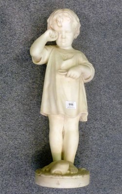 Lot 996 - A Victorian White Marble Figure of a Child, in a loose smock holding a spoon in one hand crying...