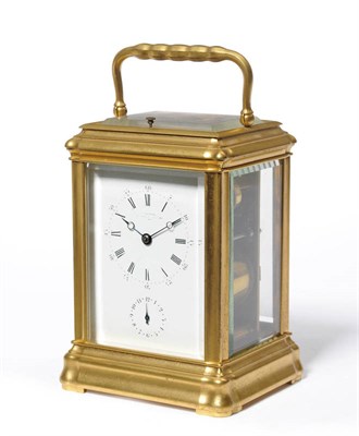 Lot 1020 - A Gilt Brass Quarter Striking and Repeating Carriage Clock with Alarm, signed Clerke, Royal...