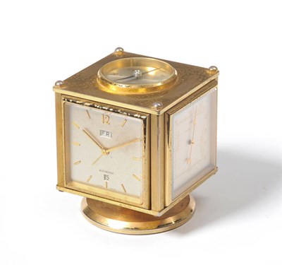 Lot 1026 - An Unusual Compendium Desk Timepiece, retailed by Bucherer, circa 1960, the cube shaped case raised