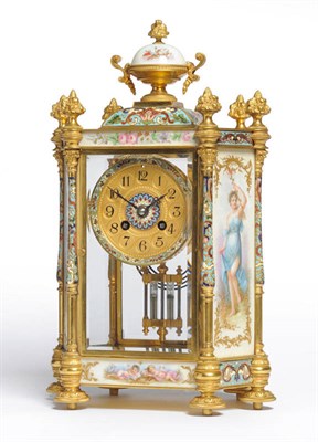 Lot 1037 - A French Gilt Brass Champleve Enamel and Porcelain Mounted Mantel Clock, circa 1900, the case...