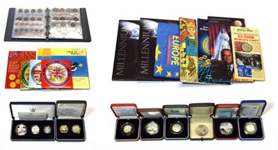Lot 2148 - A collection of mainly Royal Mint sets and silver proof coins consisting of: Deluxe Proof Sets...