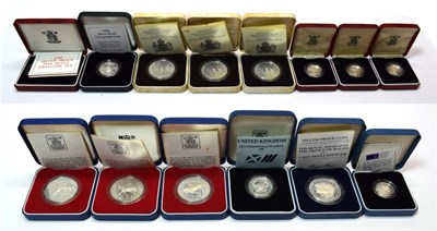 Lot 2152 - A Collection of 14 x UK Silver Proof Coins comprising: 2 x £2: 1986 'XIII Commonwealth Games'...