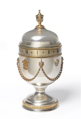 Lot 1045 - A Silver Limited Edition Urn Revolving Timepiece made to Celebrate the Marriage of HRH The...