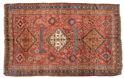 Lot 1083 - Kashgai Rug South West Persia The burgundy field of tribal motifs around three stepped...