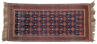 Lot 1086 - Kuchan Khelleh Khorrassan The deep indigo lattice field of stepped medallions and rows of...