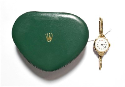 Lot 16 - A lady's 9 carat gold wristwatch, inside case back signed Rolex, W & D, London, import marks...