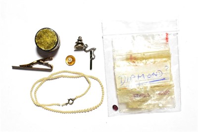 Lot 37 - A cultured pearl necklace; a button; a small pot of rough diamonds; a tie clip; a tie stud; and two