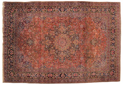 Lot 1091 - Large Saroukh Carpet West Persia The abrashed madder field richly decorated with flowering...