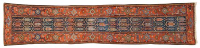 Lot 1093 - Narrow Hamadan Runner Persian Kurdistan The deep indigo field with rows of boteh enclosed by...