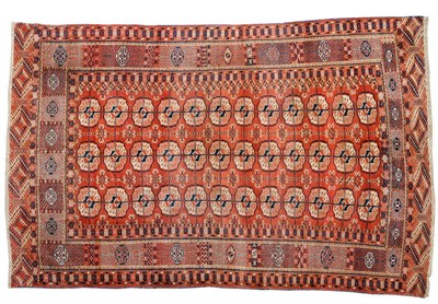 Lot 1095 - Tekke Carpet Emirate of Bukhara The soft madder field with three rows of quartered guls enclosed by