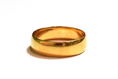 Lot 83 - An 18 carat gold band ring, finger size R
