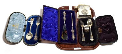 Lot 98 - Two cased silver christening sets; a cased silver-handled button hook and shoe horn; a silver...