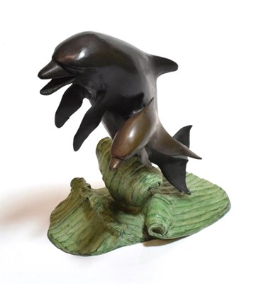 Lot 105 - A bronze model of leaping dolphins