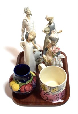 Lot 123 - An Eric Ravilious for Wedgwood Elizabeth II mug; a Walter Moorcroft berries pattern vase; and...