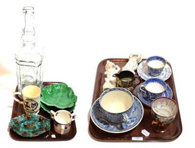 Lot 127 - A reproduction Leeds ware matrimony mug; Victorian Wedgwood leaf dishes; a bar top decanter in...