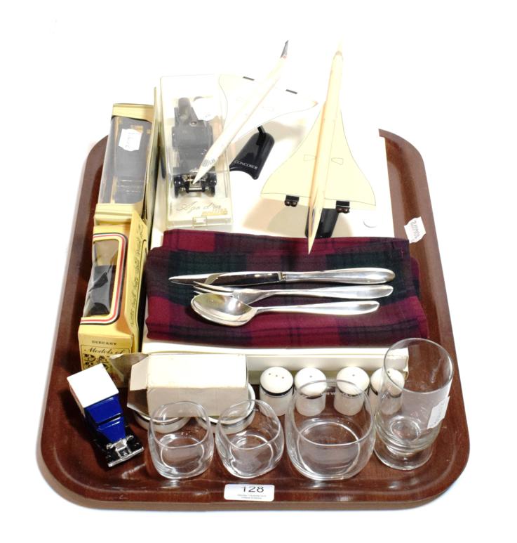 Lot 128 - A collection of Concorde memorabilia including two models; two Royal Doulton cruet sets;...