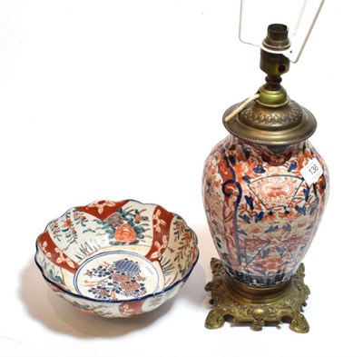 Lot 136 - A 19th century Japanese Imari bowl; together with a similar vase mounted as a lamp