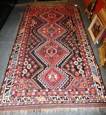 Lot 1103 - Kashgai Gabbeh Rug South West Persia The indigo field with a column of linked hooked medallions...