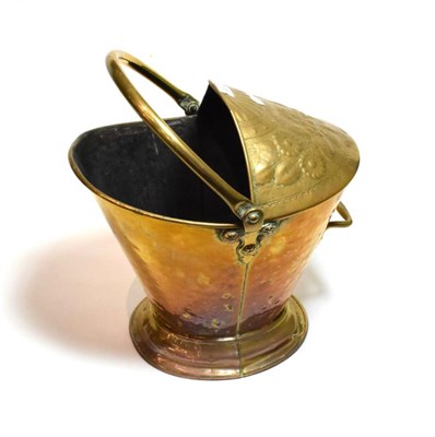 Lot 168 - A 19th century brass helmet form coal scuttle