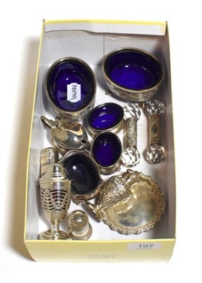 Lot 197 - A selection of silver, pair of salts with blue glass liners, pair of knife rests, pair of pin...