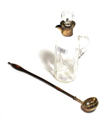 Lot 203 - A silver mounted whisky jug and a toddy ladle