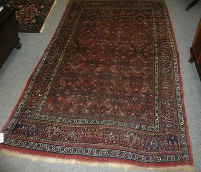 Lot 1110 - Bidjar Rug Persian Kurdistan The madder field of Herati design enclosed by indigo borders of...