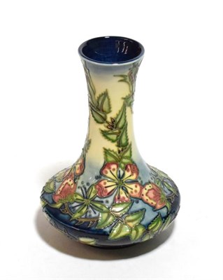 Lot 231 - A modern Moorcroft pottery vase in the Sweet Briar pattern designed by Rachel Bishop, with...