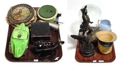 Lot 239 - A tin plate miniature record player with discs, oil lamp, glass dome, cow creamer, racing car...