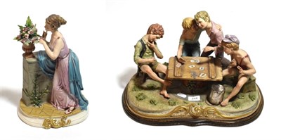 Lot 244 - A large Capodimonte group of boys playing cards; together with a Capodimonte figure of a...