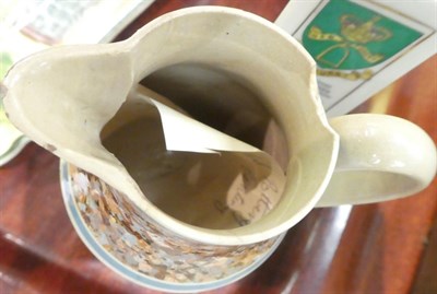 Lot 245 - A slipware moneybox dated 1885, a slipware colander, a Burslem ''Pussyfoot'' cat teapot, a 19th...