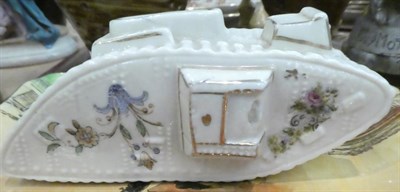 Lot 245 - A slipware moneybox dated 1885, a slipware colander, a Burslem ''Pussyfoot'' cat teapot, a 19th...