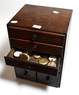 Lot 278 - A watchmaker's cabinet of six drawers with assorted contents including wristwatch and pocket...