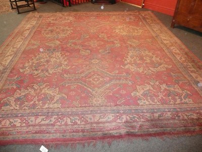 Lot 1122 - Ushak Carpet West Anatolia The soft candy pink field with rows of medallions and serrated...