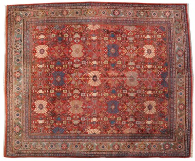 Lot 1123 - Mahal Carpet of unusual size West Persia The madder field with columns of large polychrome...