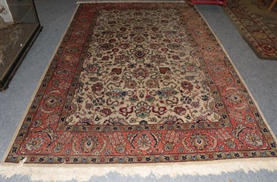 Lot 1189 - Tabriz carpet, Iranian Azerbaijan circa 1950, the ivory field of palmettes and vines enclosed...