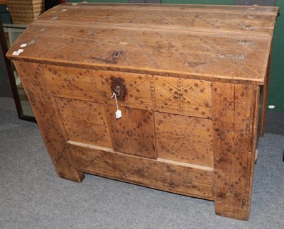 Lot 1202 - A 19th century Swedish Scandinavian pine dome top trunk, with repeating patterns, on stile...