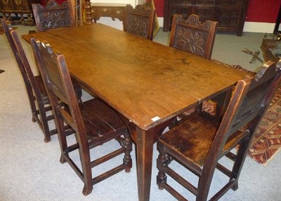 Lot 1144 - A Walnut and Elm Rectangular Farmhouse Table, circa 1800, the two-plank top raised on square...