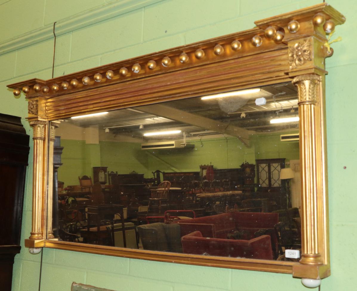Lot 1241 - A Victorian ball surmounted over mantel mirror with fluted pilasters, 145cm wide